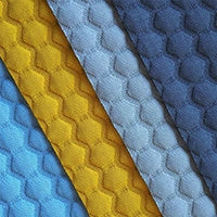 Spazio fabric sample Spazio shades of blue and yellow.