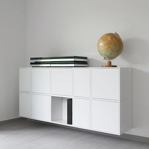 White Shelving for files with closed compartments, combined with a globe decoration.